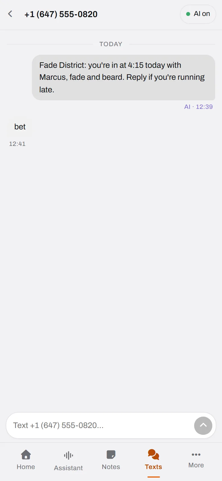 Jayden's confirmation. Sent the moment the booking landed, in the shop's own voice.